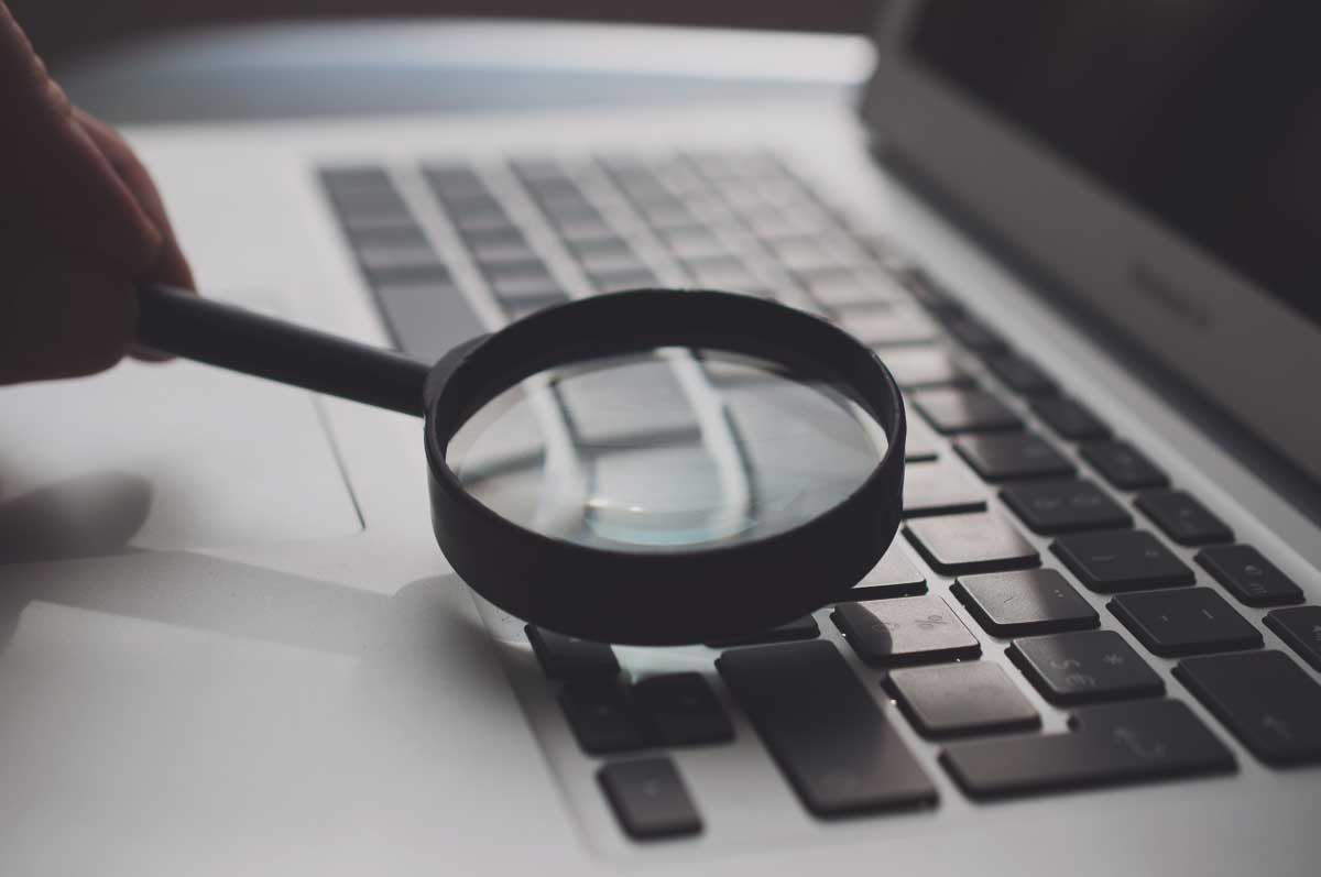 magnifying glass on keyboard