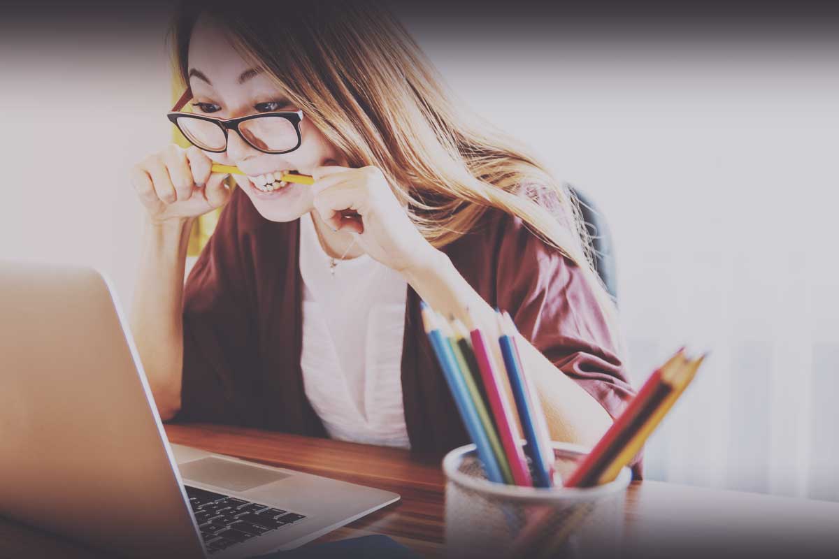 Woman stressed in front of computer